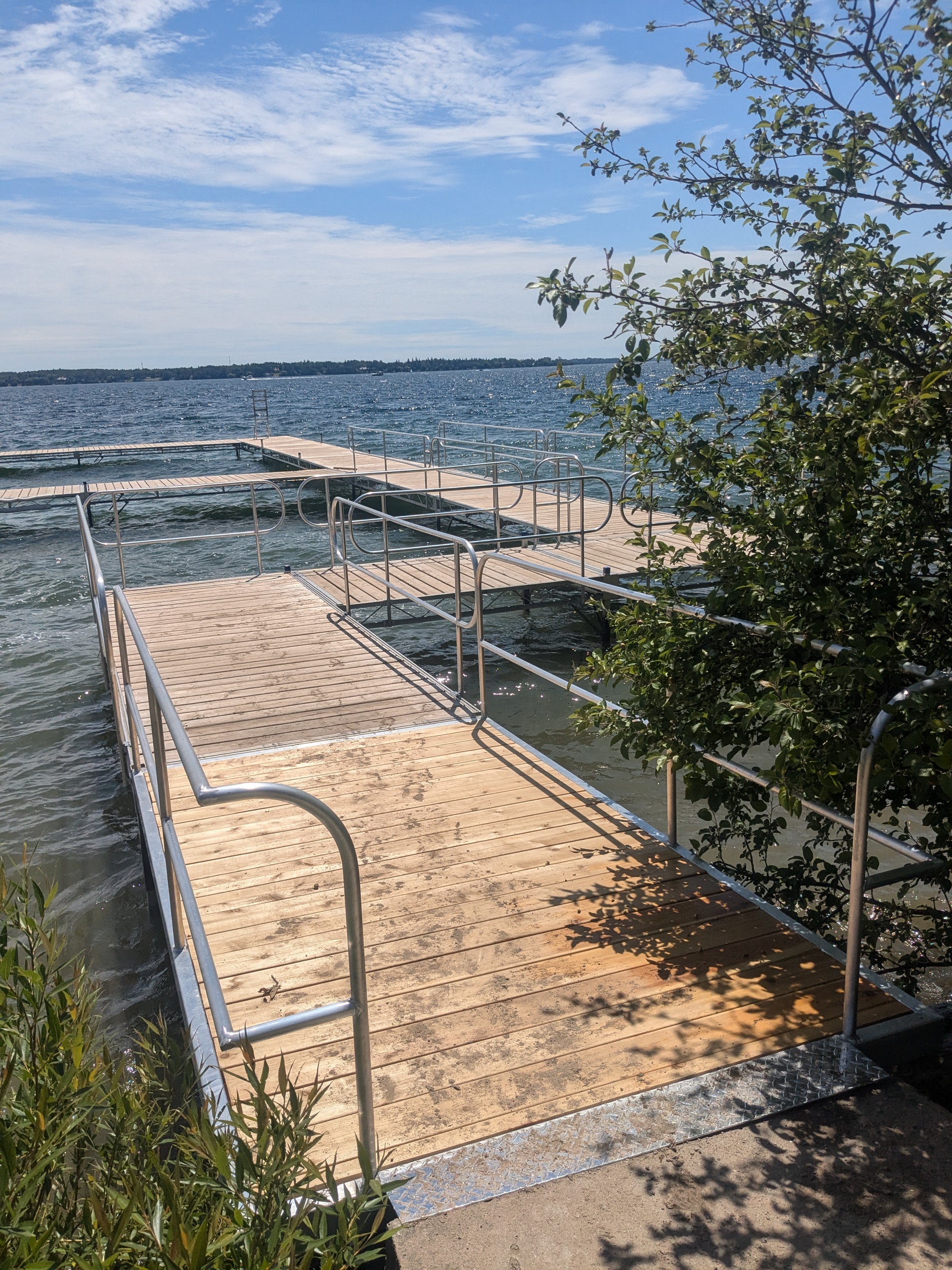 Custom aluminum railings from Workhorse Boats offer protection from unexpected falls on a dock